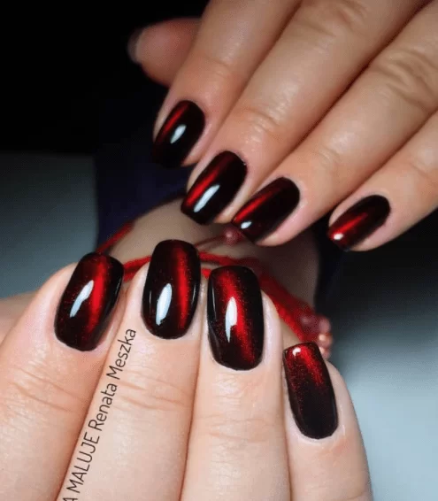 Μαύρα νύχια με cateye κόκκινο 